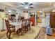 Inviting dining room featuring a floral tablecloth and a view of the kitchen at 2410 E Church St, Orlando, FL 32803