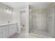 Bathroom featuring double vanity with quartz counters, a toilet and a large shower at 2418 Whitehall Cir, Winter Park, FL 32792