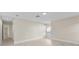 This bedroom has wood floors, neutral paint and a large window offering plenty of sunlight at 2418 Whitehall Cir, Winter Park, FL 32792