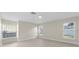 Bedroom with light wood flooring, fresh paint, and plenty of natural light at 2418 Whitehall Cir, Winter Park, FL 32792