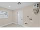 Laundry room with tile flooring, window, water heater, and hookups at 2418 Whitehall Cir, Winter Park, FL 32792