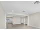 Spacious living room featuring light wood floors and neutral paint at 2418 Whitehall Cir, Winter Park, FL 32792