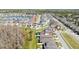 Beautiful aerial view highlighting the home's location and neighborhood amenities, near a lake at 2424 Varenna Loop, Kissimmee, FL 34741