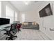 Well-lit living room with modern furniture, and large windows at 2424 Varenna Loop, Kissimmee, FL 34741