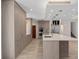 Bright kitchen features custom cabinetry, an island, and stainless steel appliances at 3326 Butler Bay N Dr, Windermere, FL 34786