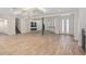 Spacious living room with tile floors, modern fireplace, and recessed lighting at 3326 Butler Bay N Dr, Windermere, FL 34786