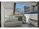 Outdoor patio with partial enclosure providing a covered area overlooking the yard and tennis court at 3326 Butler Bay N Dr, Windermere, FL 34786