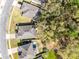 An aerial view of the property showcasing its location, surrounding neighborhood, and landscaping at 34626 Salerno Cir, Sorrento, FL 32776