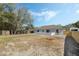 Large backyard featuring a new wooden fence and space for landscaping and recreation at 36 Se Almond Dr, Ocala, FL 34472