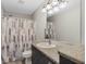 Bathroom featuring a single sink, modern vanity, and shower with curtain at 36 Se Almond Dr, Ocala, FL 34472