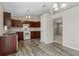 Spacious kitchen featuring ample counter space, modern appliances, and laminate flooring at 36 Se Almond Dr, Ocala, FL 34472