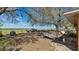 Expansive backyard featuring equipment and plenty of open space, ideal for outdoor activities at 37149 Sandy Ln, Grand Island, FL 32735