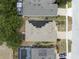 Aerial view of the home's solar panels and screened-in pool in a quiet neighborhood at 3823 Ryegrass St, Clermont, FL 34714