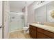 Bathroom featuring shower, vanity, and tile flooring at 3823 Ryegrass St, Clermont, FL 34714