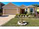 Charming single-Gathering home with manicured lawn and inviting curb appeal at 3823 Ryegrass St, Clermont, FL 34714