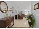 Inviting living room featuring tile floors, comfortable brown sofas, and tasteful decor at 3823 Ryegrass St, Clermont, FL 34714