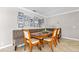 Dining area with table, chairs, built-in seating, and a photo gallery on the wall at 415 Flagler Rd, Winter Haven, FL 33884