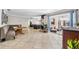 Spacious living room with dining area and a large sliding glass door to the outdoor patio area at 415 Flagler Rd, Winter Haven, FL 33884