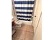 Modest bathroom with toilet, shower and tiled flooring at 4220 Solomon Dr, Orlando, FL 32811