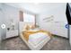 Stylish bedroom with a queen-sized bed, neutral decor, and large windows at 4338 Rhyme St, Kissimmee, FL 34746