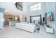 Bright living area with high ceilings, tile floors, and large windows filling the space with natural light at 4338 Rhyme St, Kissimmee, FL 34746