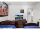 Themed bedroom with two twin beds, TV and wall art at 5260 Oakbourne Ave, Davenport, FL 33837