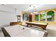 Spacious game room with pool table, foosball, air hockey, and wall art at 5260 Oakbourne Ave, Davenport, FL 33837