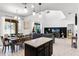 Spacious living area with an island and table for dining at 5260 Oakbourne Ave, Davenport, FL 33837