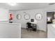 Bright loft area with a desk and chair at 5260 Oakbourne Ave, Davenport, FL 33837