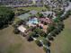 Aerial view of community amenities, including a pool, tennis and basketball courts at 604 Fortanini Cir, Ocoee, FL 34761