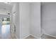 Hallway with an open layout and wood-look tiling at 604 Fortanini Cir, Ocoee, FL 34761