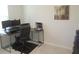 Functional home office space with a modern desk setup and natural light at 6147 Arbor Watch Loop, Orlando, FL 32829