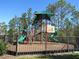 Fenced playground with climbing structures and slides for community fun at 6147 Arbor Watch Loop, Orlando, FL 32829