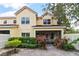 Rear exterior view of a residential building, highlighting the well-maintained grounds at 6881 Piazza St, Orlando, FL 32819