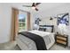 Stylish bedroom with a comfortable queen-size bed, modern décor, and ample natural light at 8718 Sw 139Th Place Rd # 29, Ocala, FL 34473