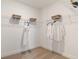 Well-organized walk-in closet with shelving and hanging rods, providing ample storage space at 8718 Sw 139Th Place Rd # 29, Ocala, FL 34473