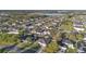 Aerial view of neighborhood, showing the lake and many homesites in the area at 9526 Water Fern Cir, Clermont, FL 34711
