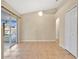 The dining room offers tile flooring, and sliding door access to the lanai at 9526 Water Fern Cir, Clermont, FL 34711