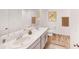 Bright bathroom with double sinks and a large mirror at 966 Sweetbrier Dr, Deltona, FL 32725