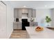Modern kitchen with stainless steel appliances and granite countertops at 966 Sweetbrier Dr, Deltona, FL 32725
