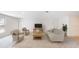 Spacious living room with plush seating and natural light at 966 Sweetbrier Dr, Deltona, FL 32725