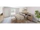 Comfortable bedroom with natural light and neutral decor at 966 Sweetbrier Dr, Deltona, FL 32725