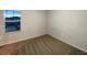Neutral painted bedroom with carpet and a bright window at 987 Desert Candle Dr, Ocoee, FL 34761