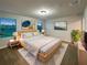 Comfortable bedroom featuring a plush rug, modern lighting, and large windows at 987 Desert Candle Dr, Ocoee, FL 34761