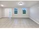 Bright and airy living room with sliding glass door and large windows at 987 Desert Candle Dr, Ocoee, FL 34761