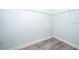 Walk-in closet with installed shelving and hardwood floors providing ample storage at 1104 Grove Manor Dr, Sanford, FL 32771
