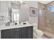 Bathroom features walk-in shower, vanity, and toilet, offering a comfortable and functional space at 1281 Grand Traverse Pkwy, Reunion, FL 34747