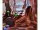 The themed bedroom features a tree trunk design with painted murals of a forest at 1281 Grand Traverse Pkwy, Reunion, FL 34747