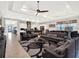 Open-concept home with kitchen island, comfortable living area, and stylish decor at 1281 Grand Traverse Pkwy, Reunion, FL 34747