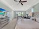 Spacious main bedroom includes a media center, sitting area, and views at 1281 Grand Traverse Pkwy, Reunion, FL 34747